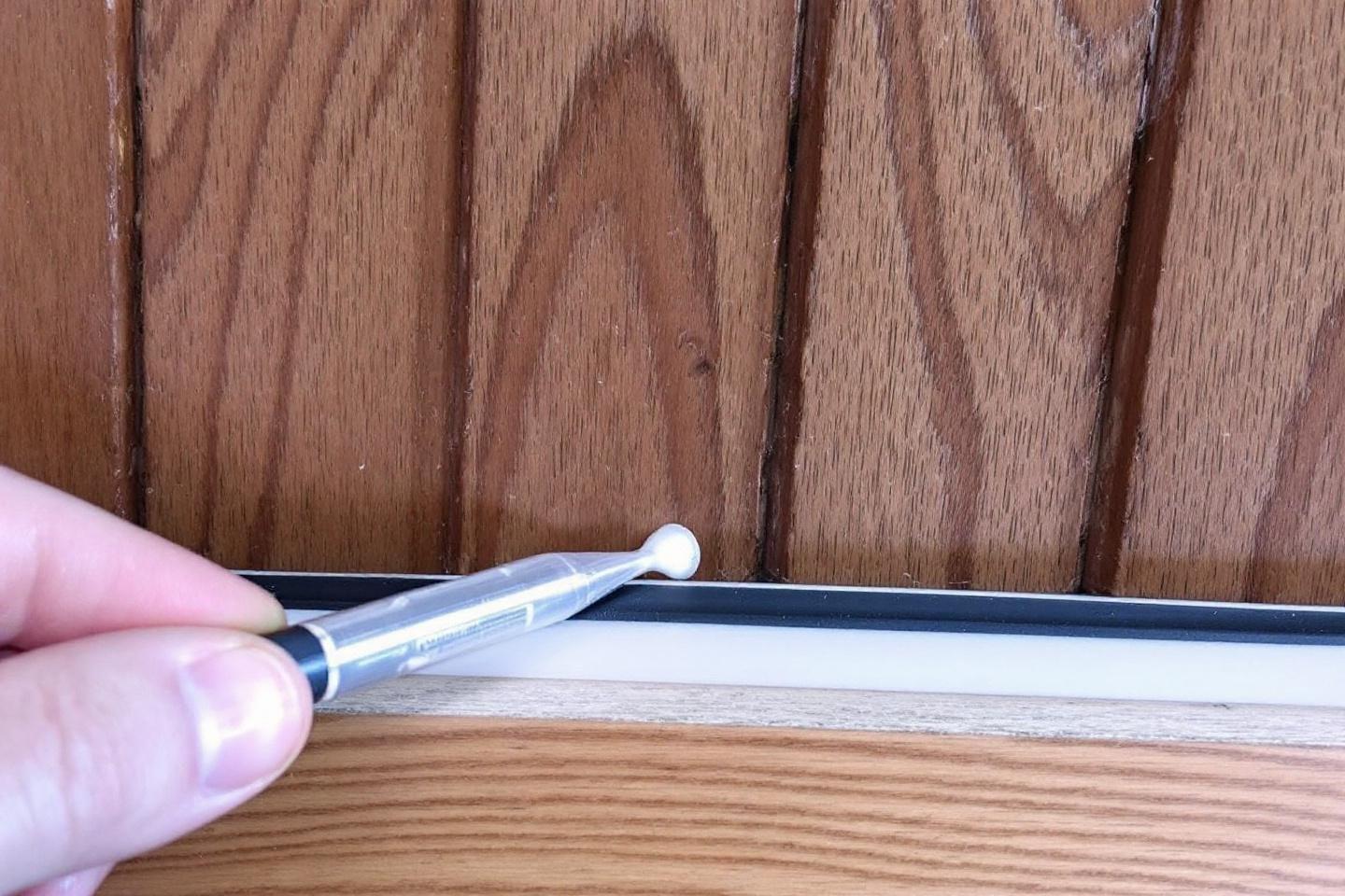 Comment combler l'espace entre une porte coulissante et le mur